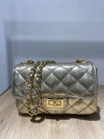 Bolso de piel dorado