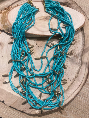 Collar turquesa con  detalles acero