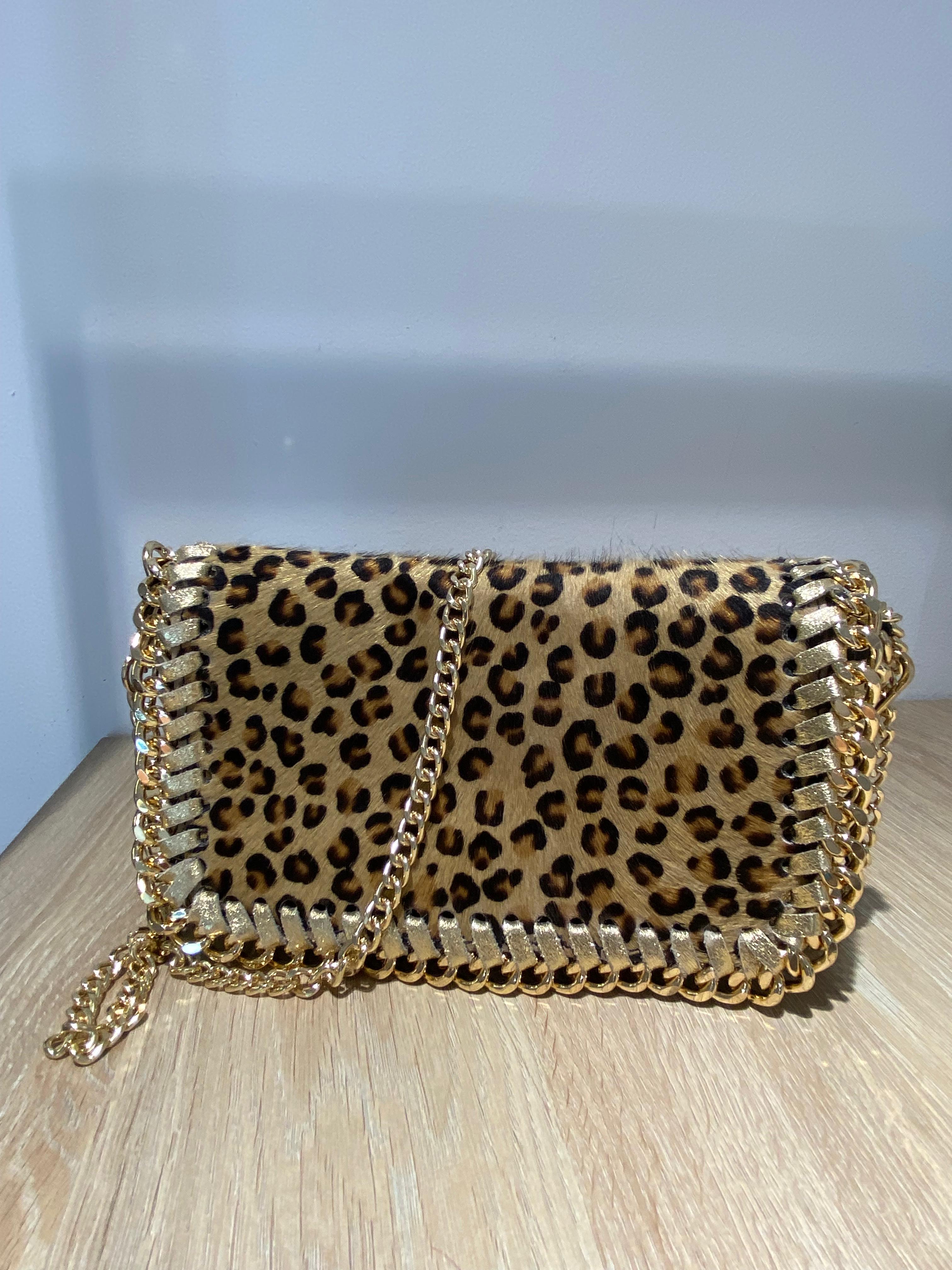 Bolso piel y cadena