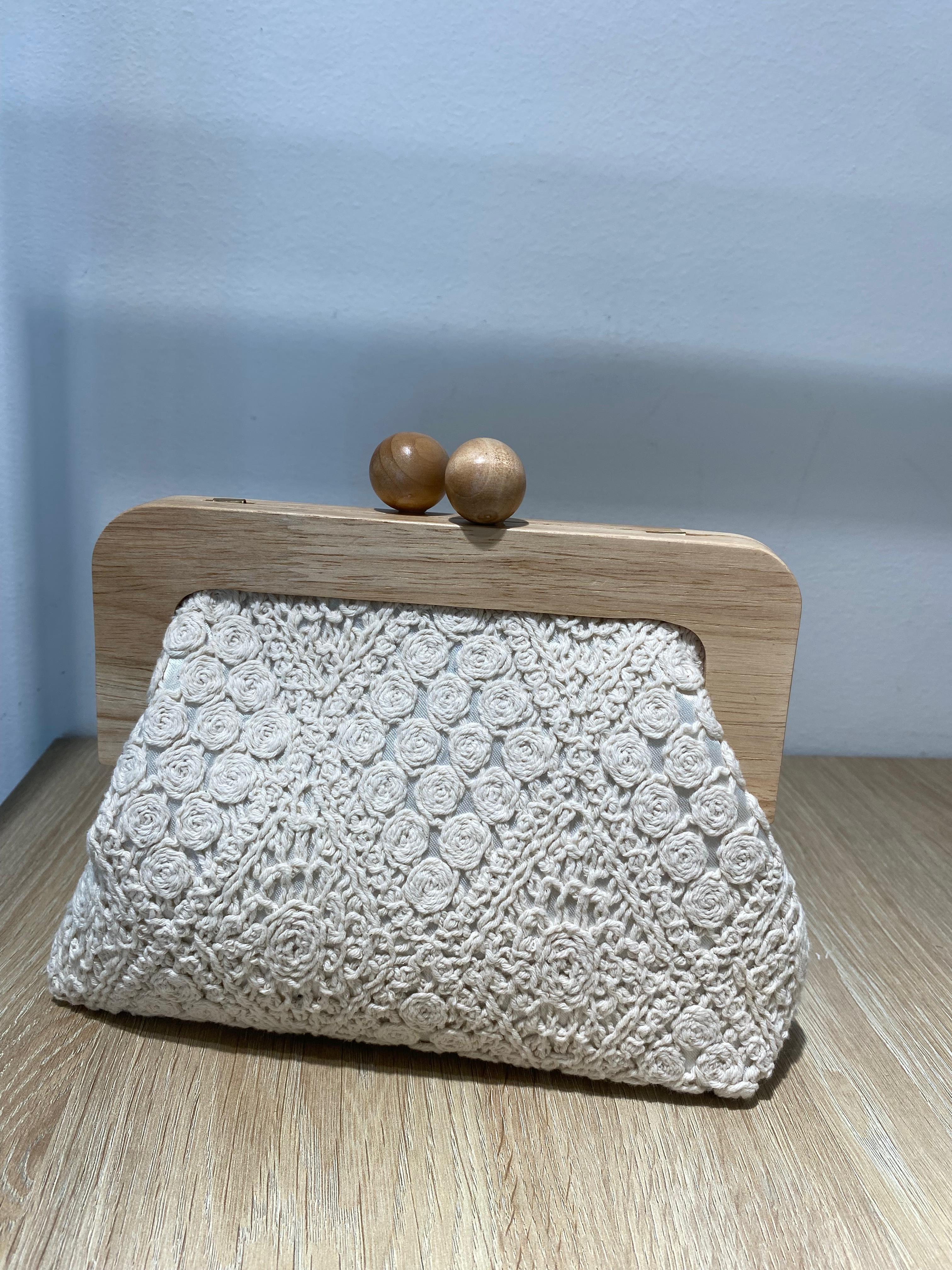 Bolso mano tipo monedero