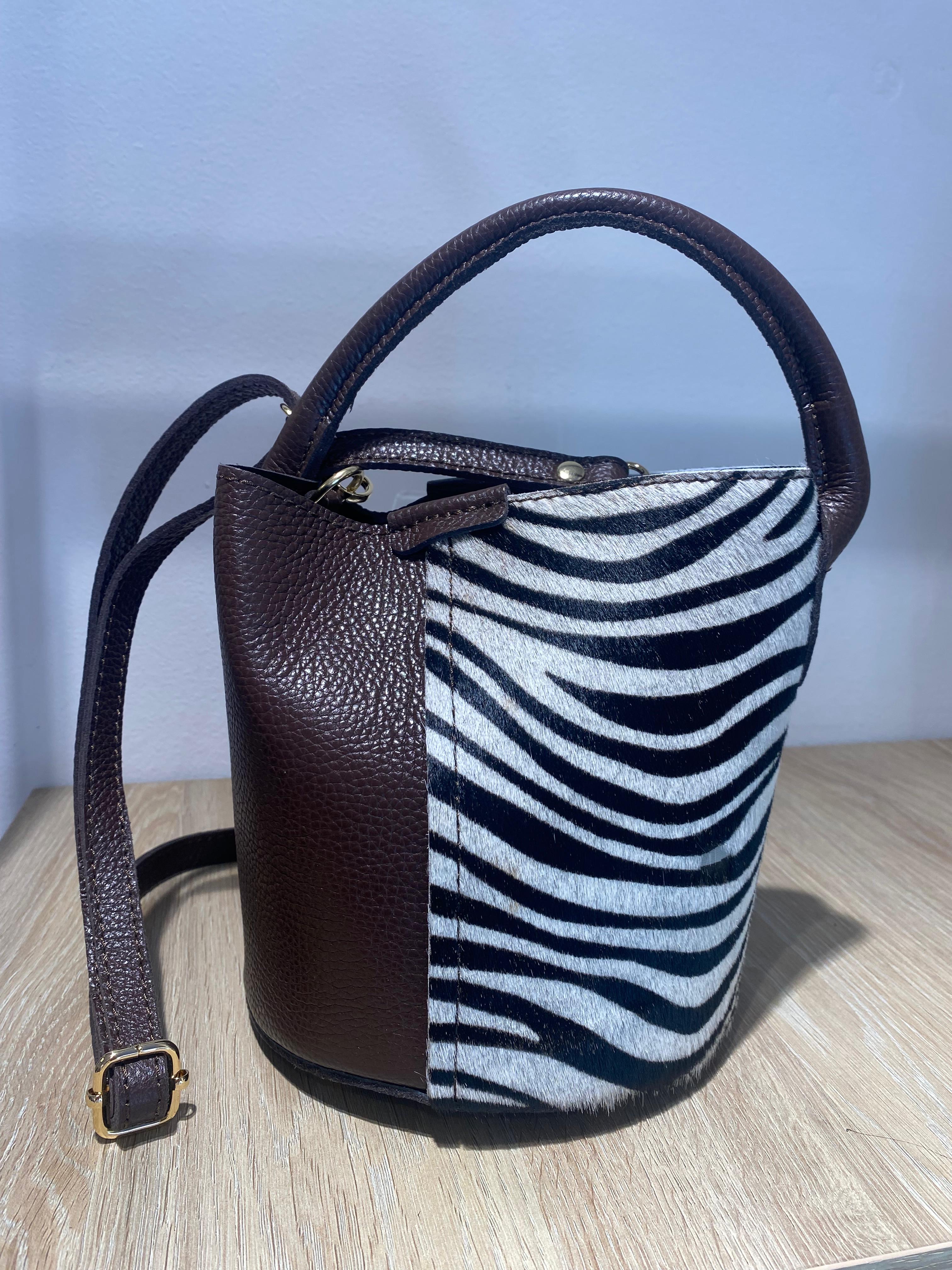 Bolso piel detalle combinado zebra