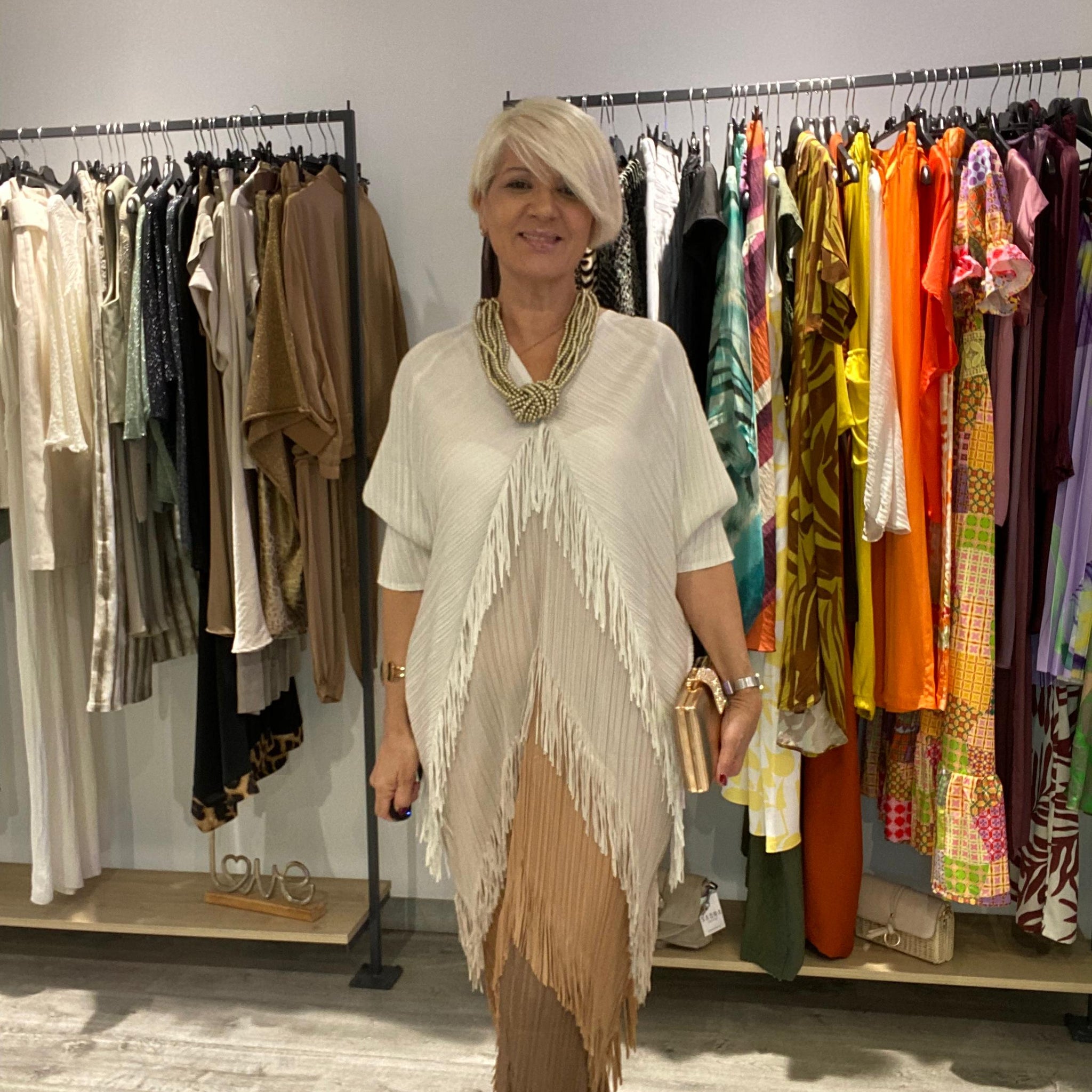 Vestido boho  flecos beige talla única 38/50