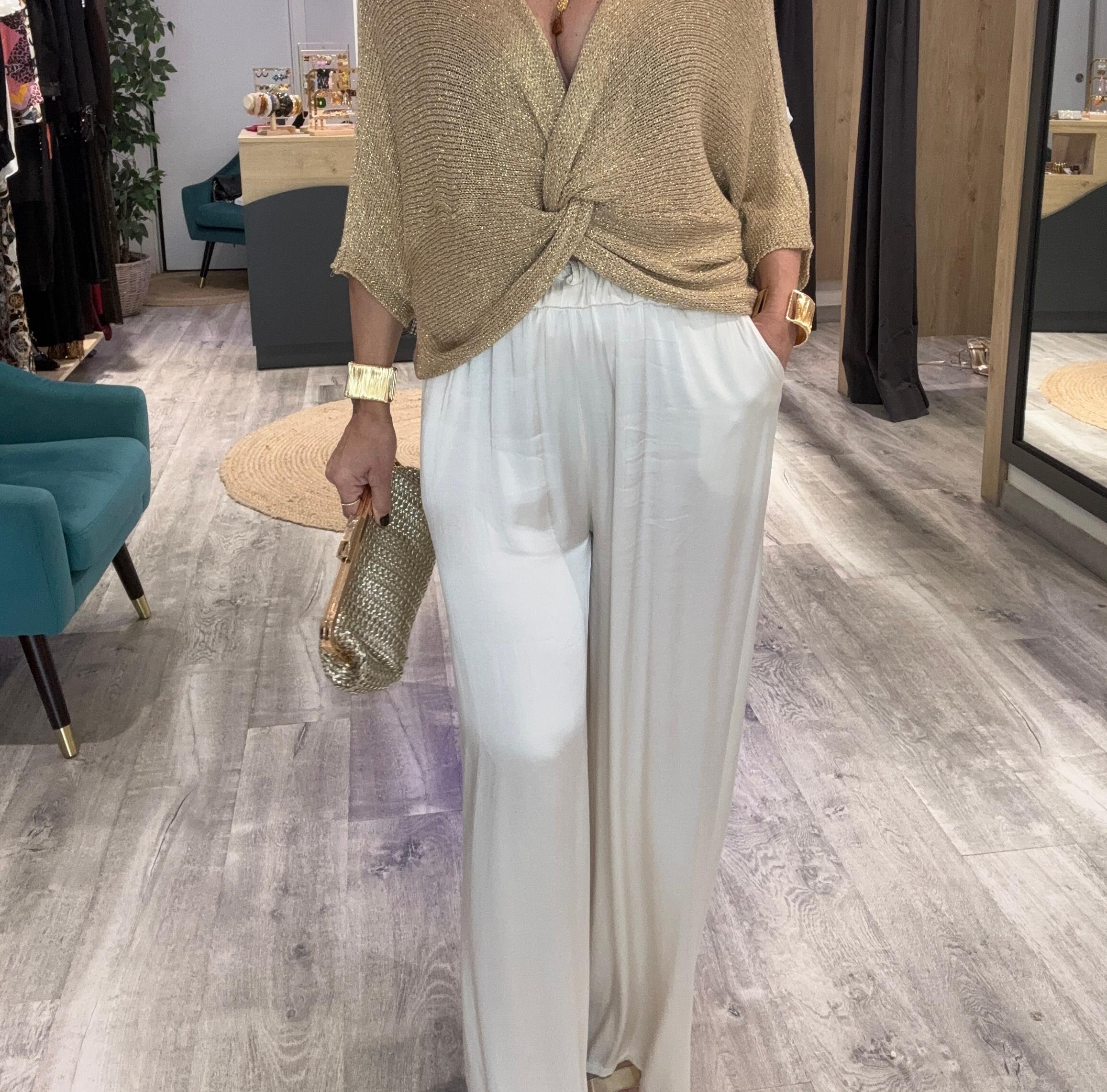 Pantalón palazzo satinado beige